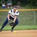 Saline junior shortstop Laura Vaccaro picks up a ball in the game against Allen Park on Saturday, June 8. Daniel Brenner I AnnArbor.com
